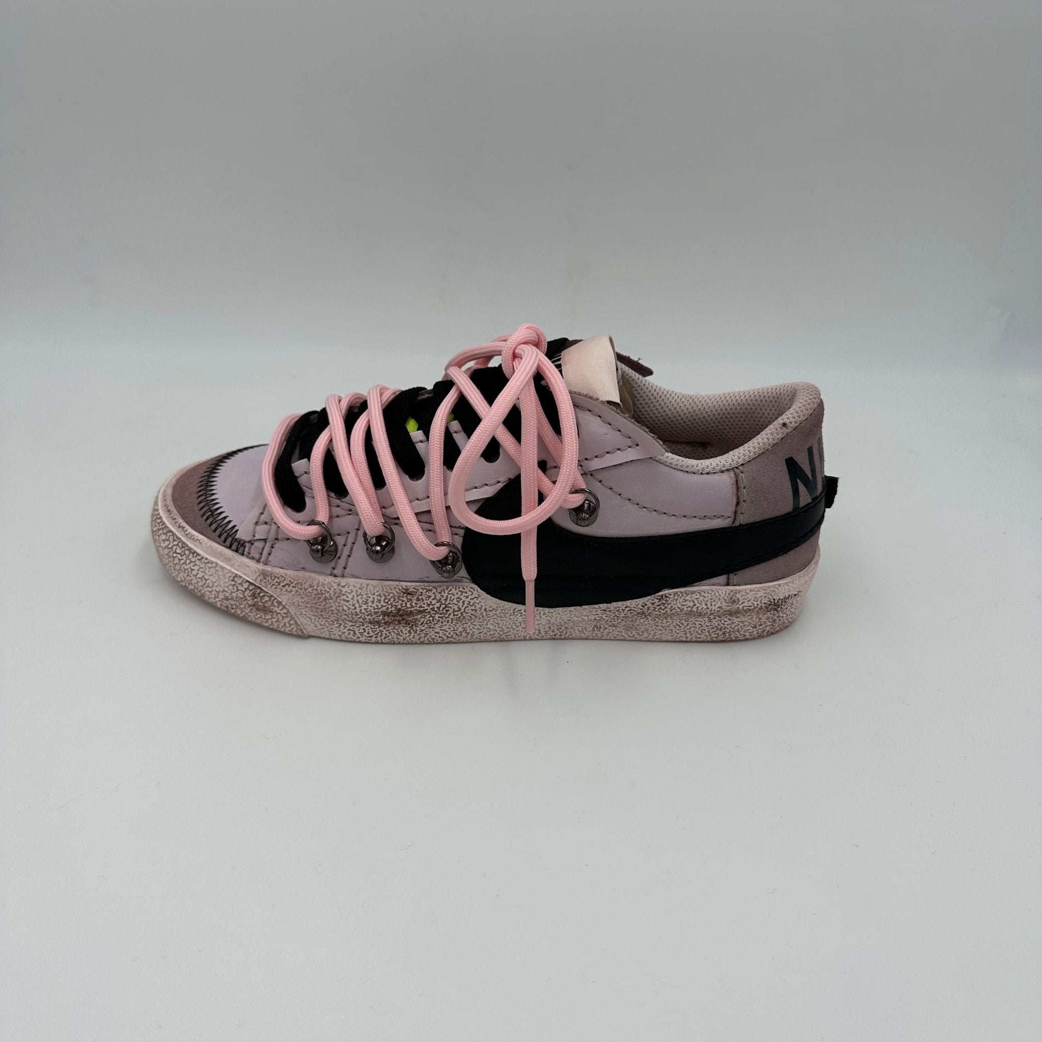 pink and black nike blazer